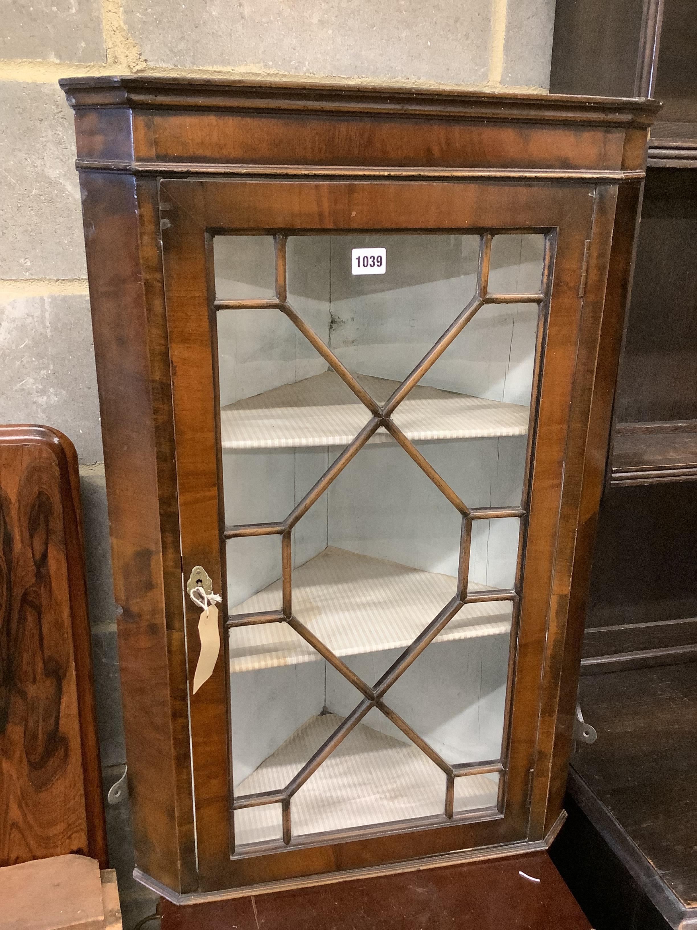 A Queen Anne style hanging corner cabinet, width 55cm, depth 32cm, height 83cm